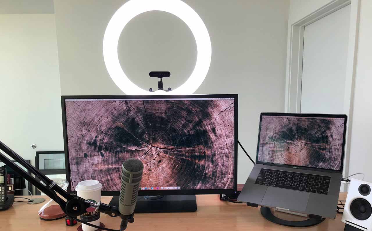 LED video ring light set up with a desktop computer monitor
